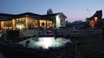 Antalya Korkutelinde Seralı Tek Katlı Satılık Villa